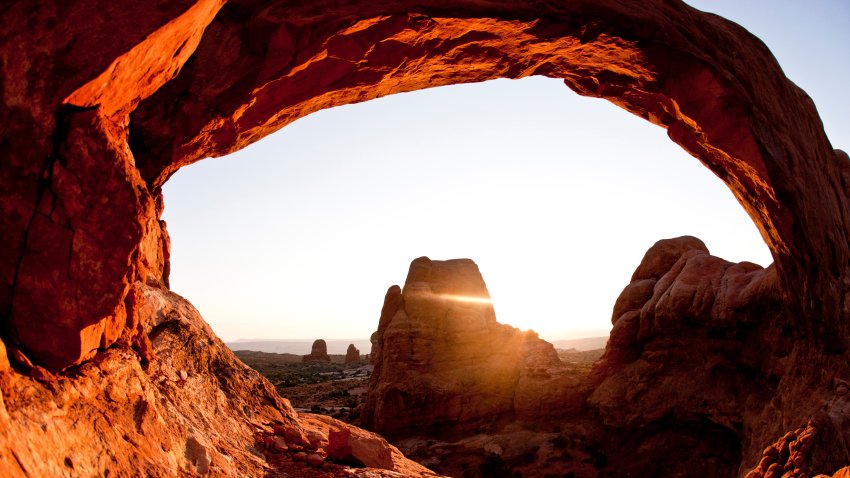 Windows arch at sunset in Arches National Park near Moab Utah.