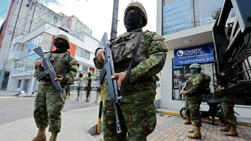 QUITO, ECUADOR – JANUARY 10: Military personnel stands guard at Canela Radio on January 10, 2024 in Quito, Ecuador. President Noboa declared “internal armed conflict” after hooded and armed men broke into TC Television’s live broadcast, among other violent incidents across the country on Tuesday. Ecuador has been hit by explosions, police kidnappings, and prison disturbances since Noboa on Monday declared a nationwide state of emergency after gang leader Adolfo “Fito” Macias escaped from a prison in Guayaquil. (Photo by Franklin Jacome/Agencia Press South/Getty Images)