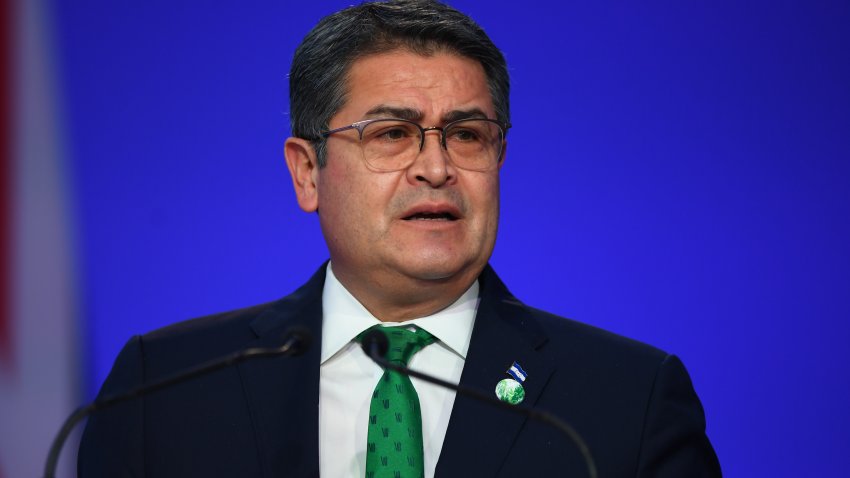 GLASGOW, SCOTLAND – NOVEMBER 01: Hondura President Juan Orlando Hernández presents his national statement during day two of COP26 at SECC on November 1, 2021 in Glasgow, United Kingdom. 2021 sees the 26th United Nations Climate Change Conference. The conference will run from 31 October for two weeks, finishing on 12 November. It was meant to take place in 2020 but was delayed due to the Covid-19 pandemic. (Photo by Andy Buchanan – Pool/Getty Images)