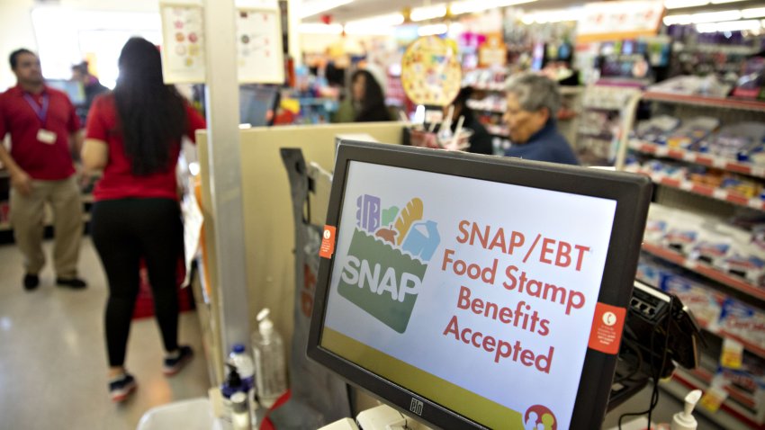 “SNAP/EBT Food Stamp Benefits Accepted” is displayed on a screen inside a Family Dollar Stores Inc. store in Chicago, Illinois, U.S., on Tuesday, March 3, 2020. Dollar Tree Inc. released earnings figures on March 4. Photographer: Daniel Acker/Bloomberg via Getty Images