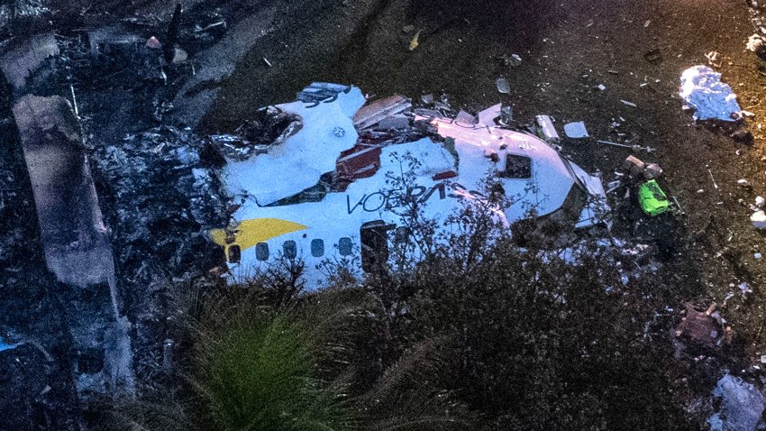 TOPSHOT – Aerial view of the wreckage of an airplane that crashed with 61 people on board in Vinhedo, Sao Paulo State, Brazil, on August 9, 2024. An airplane carrying 57 passengers and four crew crashed on August 9 in Brazil’s Sao Paulo state, killing everyone on board, local officials said. The aircraft, a French-made ATR 72-500 operated by the airline Voepass, was travelling from Cascavel in southern Parana state to Sao Paulo’s Guarulhos international airport when it crashed in the city of Vinhedo. (Photo by Miguel SCHINCARIOL / AFP) (Photo by MIGUEL SCHINCARIOL/AFP via Getty Images)