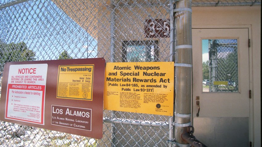 370826 01: FILE PHOTO Signs are posted on the gated wall around the main technical area of Los Alamos National Laboratory, NM June 14, 1999 to keep visitors informed about security. The disappearance of nuclear weapons data was disclosed publicly June 12, 2000 after a week long investigation by FBI and Energy Department Agents. (Photo by Joe Raedle/Newsmakers)