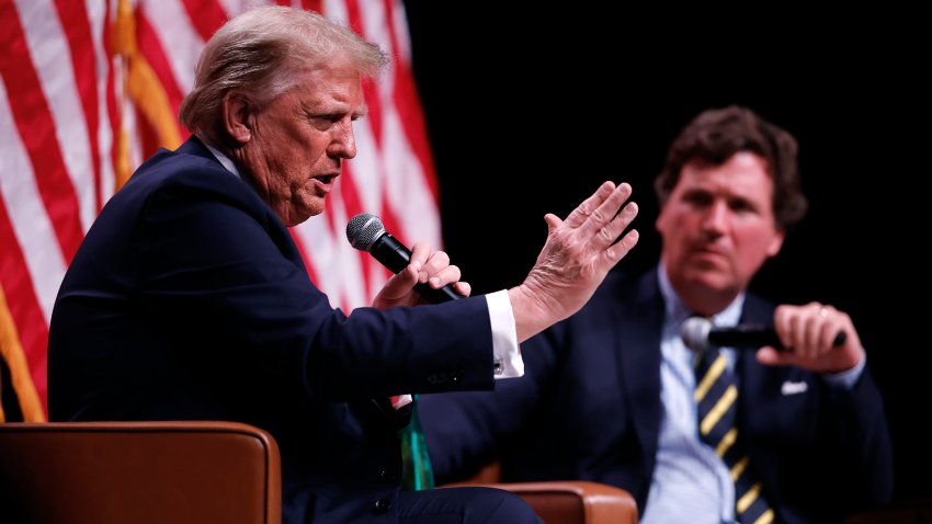 PHOENIX, ARIZONA – OCTOBER 31: Republican presidential nominee, former President Donald Trump sits down for a conversation with Tucker Carlson during his Live Tour at the Desert Diamond Arena on October 31, 2024 in Phoenix, Arizona. With less than a week until Election Day, Trump is campaigning for re-election in New Mexico and the battleground states of Nevada and Arizona on Thursday. (Photo by Chip Somodevilla/Getty Images)