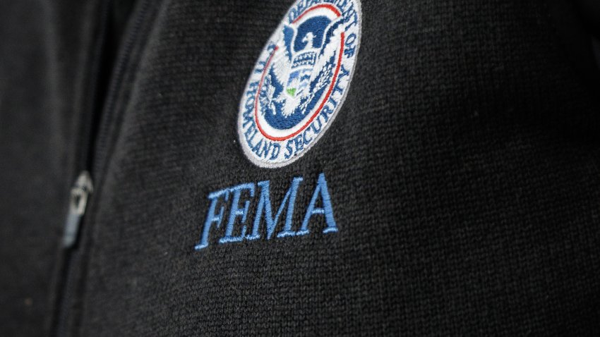 The Federal Emergency Management Agency (FEMA) logo during a news conference in the James S. Brady Press Briefing Room at the White House in Washington, DC, US, on Tuesday, Aug. 29, 2023. Hurricane Idalia churned into Georgia after knocking out power to hundreds of thousands of Florida customers, grounding more than 900 flights and unleashing floods along far from where it came ashore as a Category 3 storm earlier today. Photographer: Samuel Corum/Sipa/Bloomberg via Getty Images