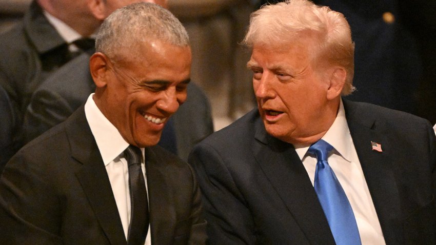 TOPSHOT – Former US President Barack Obama speaks with President-elect Donald Trump before the State Funeral Service for former US President Jimmy Carter at the Washington National Cathedral in Washington, DC, on January 9, 2025. (Photo by ROBERTO SCHMIDT / AFP) (Photo by ROBERTO SCHMIDT/AFP via Getty Images)