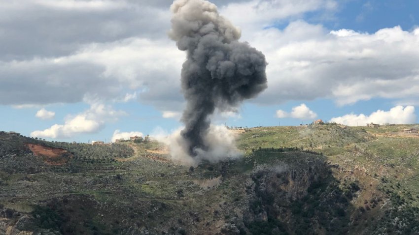 Smoke billows from the site of Israeli artillery shelling that targeted the area of the southern Lebanese village of Yohmor on March 22, 2025. An Israeli strike on the south Lebanese town of Touline killed one woman on March 22, state media reported, after Israel threatened a severe response to rockets it said had been fired from Lebanon. (Photo by Rabih DAHER / AFP) (Photo by RABIH DAHER/AFP via Getty Images)