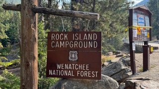 The entrance to Rock Island Campground, where multiple law enforcement agencies are participating in the search this month for Travis Decker, who is charged with murder and kidnapping, near Leavenworth, Wash.